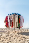 Improvised sun umbrella as a display for selling dresses on Copacabana Beach - Rio de Janeiro city - Rio de Janeiro state (RJ) - Brazil