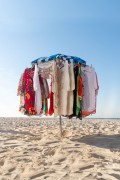 Improvised sun umbrella as a display for selling dresses on Copacabana Beach - Rio de Janeiro city - Rio de Janeiro state (RJ) - Brazil