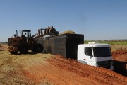 Wheel loader loading trucks with sugarcane silage - Mirassol city - Sao Paulo state (SP) - Brazil