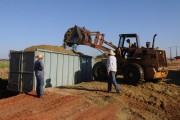 Wheel loader loading trucks with sugarcane silage - Mirassol city - Sao Paulo state (SP) - Brazil