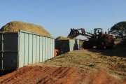 Wheel loader loading trucks with sugarcane silage - Mirassol city - Sao Paulo state (SP) - Brazil