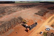 Picture taken with drone of tree chipper working on biomass production in a rubber plantation that was eradicated - Planalto city - Sao Paulo state (SP) - Brazil