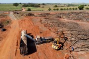 Picture taken with drone of tree chipper working on biomass production in a rubber plantation that was eradicated - Planalto city - Sao Paulo state (SP) - Brazil