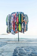 Improvised sun umbrella as a display for selling dresses on Copacabana Beach - Rio de Janeiro city - Rio de Janeiro state (RJ) - Brazil