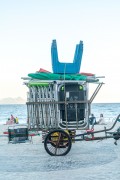 Detail of cargo trolley - man carrying a cart - with beach chairs - Copacabana Beach waterfront - Rio de Janeiro city - Rio de Janeiro state (RJ) - Brazil