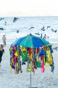 Improvised sun umbrella as a display for selling bikinis on Copacabana Beach - Rio de Janeiro city - Rio de Janeiro state (RJ) - Brazil