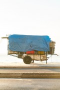 Detail of cargo trolley - man carrying a cart - with beach chairs - Copacabana Beach waterfront - Rio de Janeiro city - Rio de Janeiro state (RJ) - Brazil