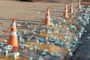 Plastic cups scattered on the floor after the Rio de Janeiro Half Marathon - Atlantica Avenue - Rio de Janeiro city - Rio de Janeiro state (RJ) - Brazil