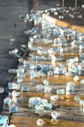 Plastic cups scattered on the floor after the Rio de Janeiro Half Marathon - Atlantica Avenue - Rio de Janeiro city - Rio de Janeiro state (RJ) - Brazil