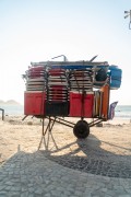 Detail of cargo trolley - man carrying a cart - with beach chairs - Copacabana Beach waterfront - Rio de Janeiro city - Rio de Janeiro state (RJ) - Brazil