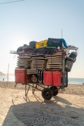 Detail of cargo trolley - man carrying a cart - with beach chairs - Copacabana Beach waterfront - Rio de Janeiro city - Rio de Janeiro state (RJ) - Brazil