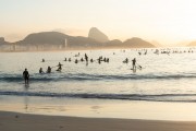 Practitioners of Stand up paddle - post 6 of Copacabana Beach with the Sugar Loaf in the background - Rio de Janeiro city - Rio de Janeiro state (RJ) - Brazil