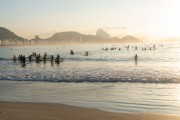 Practitioners of Stand up paddle - post 6 of Copacabana Beach with the Sugar Loaf in the background - Rio de Janeiro city - Rio de Janeiro state (RJ) - Brazil