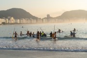 Practitioners of Stand up paddle - post 6 of Copacabana Beach with the Sugar Loaf in the background - Rio de Janeiro city - Rio de Janeiro state (RJ) - Brazil