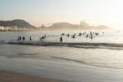 Practitioners of Stand up paddle - post 6 of Copacabana Beach with the Sugar Loaf in the background - Rio de Janeiro city - Rio de Janeiro state (RJ) - Brazil