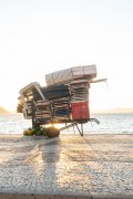 Detail of cargo trolley - man carrying a cart - with beach chairs - Copacabana Beach waterfront - Rio de Janeiro city - Rio de Janeiro state (RJ) - Brazil