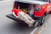 Fire Department vehicle carrying a mannequin dressed in the corporations uniform in the trunk - Celebration of the 132nd Anniversary of Copacabana (1892-2024) - Rio de Janeiro city - Rio de Janeiro state (RJ) - Brazil