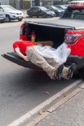 Fire Department vehicle carrying a mannequin dressed in the corporations uniform in the trunk - Celebration of the 132nd Anniversary of Copacabana (1892-2024) - Rio de Janeiro city - Rio de Janeiro state (RJ) - Brazil