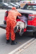 Fire Department vehicle carrying a mannequin dressed in the corporations uniform in the trunk - Celebration of the 132nd Anniversary of Copacabana (1892-2024) - Rio de Janeiro city - Rio de Janeiro state (RJ) - Brazil