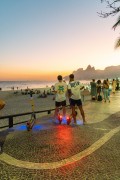 People on scooters watching the sunset from Arpoador - Rio de Janeiro city - Rio de Janeiro state (RJ) - Brazil