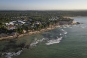 Picture taken with drone of cliffs and the Beach of Golfinhos Bay  - Tibau do Sul city - Rio Grande do Norte state (RN) - Brazil