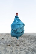 Closed sun umbrella in the form of a display with beach products inside - Rio de Janeiro city - Rio de Janeiro state (RJ) - Brazil