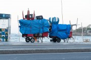 Detail of cargo trolley - man carrying a cart - with beach chairs - Copacabana Beach waterfront - Rio de Janeiro city - Rio de Janeiro state (RJ) - Brazil