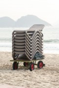 Detail of cargo trolley - man carrying a cart - with beach chairs - Copacabana Beach - Rio de Janeiro city - Rio de Janeiro state (RJ) - Brazil