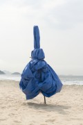 Closed sun umbrella in the form of a display with beach products inside - Rio de Janeiro city - Rio de Janeiro state (RJ) - Brazil