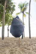 Closed sun umbrella in the form of a display with beach products inside - Rio de Janeiro city - Rio de Janeiro state (RJ) - Brazil