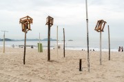 Flagpoles with wooden boxes on top - Copacabana Beach - Rio de Janeiro city - Rio de Janeiro state (RJ) - Brazil