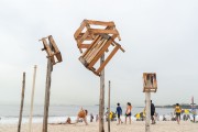 Flagpoles with wooden boxes on top - Copacabana Beach - Rio de Janeiro city - Rio de Janeiro state (RJ) - Brazil