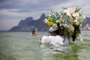 Devotees deliver gifts to Iemanja, the queen of the waters of Afro-Brazilian cults - Arpoador Beach - Rio de Janeiro city - Rio de Janeiro state (RJ) - Brazil