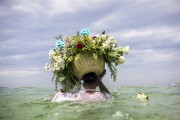 Devotees deliver gifts to Iemanja, the queen of the waters of Afro-Brazilian cults - Arpoador Beach - Rio de Janeiro city - Rio de Janeiro state (RJ) - Brazil