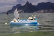 Devotees deliver gifts to Iemanja, the queen of the waters of Afro-Brazilian cults - Arpoador Beach - Rio de Janeiro city - Rio de Janeiro state (RJ) - Brazil