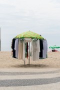 Improvised sun umbrella as a display for selling dresses on Copacabana Beach - Rio de Janeiro city - Rio de Janeiro state (RJ) - Brazil