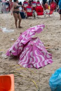 Sun umbrella protecting a water pump on Arpoador Beach - Rio de Janeiro city - Rio de Janeiro state (RJ) - Brazil