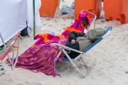 Bather protecting herself from the sun with a Kanga beach - Copacabana Beach - Rio de Janeiro city - Rio de Janeiro state (RJ) - Brazil