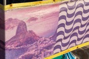 Image of Sugarloaf Mountain and Copacabana boardwalk, printed on canvas, decorating a stall - Arpoador Beach - Rio de Janeiro city - Rio de Janeiro state (RJ) - Brazil