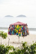 Improvised sun umbrella as a display for selling bikinis on Copacabana Beach - Rio de Janeiro city - Rio de Janeiro state (RJ) - Brazil