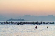 Practitioners of Stand up paddle watching the sunrise - post 6 of Copacabana Beach - Rio de Janeiro city - Rio de Janeiro state (RJ) - Brazil