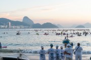 Group of people paying homage to Yemanja at sunrise at the Z-13 fishing colony at Post 6 on Copacabana Beach - Rio de Janeiro city - Rio de Janeiro state (RJ) - Brazil