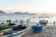 Group of people paying homage to Yemanja at sunrise at the Z-13 fishing colony at Post 6 on Copacabana Beach - Rio de Janeiro city - Rio de Janeiro state (RJ) - Brazil