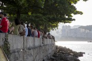 People socializing and drinking sitting by the sea in Short wall of Urca  - Rio de Janeiro city - Rio de Janeiro state (RJ) - Brazil