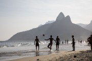 Bathers playing soccer - Ipanema Beach waterfront with the Morro Dois Irmaos (Two Brothers Mountain) in the background - Rio de Janeiro city - Rio de Janeiro state (RJ) - Brazil