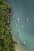 Picture taken with drone of boats at Feiticeira Beach (Witch Beach) waterfront - Angra dos Reis city - Rio de Janeiro state (RJ) - Brazil