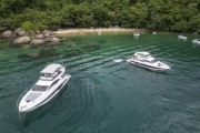 Picture taken with drone of boats at Feiticeira Beach (Witch Beach) waterfront - Angra dos Reis city - Rio de Janeiro state (RJ) - Brazil