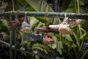 Old shoes tied with string in a degree - Babilonia Slum - Rio de Janeiro city - Rio de Janeiro state (RJ) - Brazil