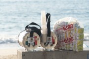 Gallon of mate with disposable plastic cups and bag of GLOBO flour cookies - Post 6 on Copacabana Beach - Rio de Janeiro city - Rio de Janeiro state (RJ) - Brazil