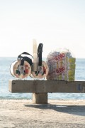 Gallon of mate with disposable plastic cups and bag of GLOBO flour cookies - Post 6 on Copacabana Beach - Rio de Janeiro city - Rio de Janeiro state (RJ) - Brazil